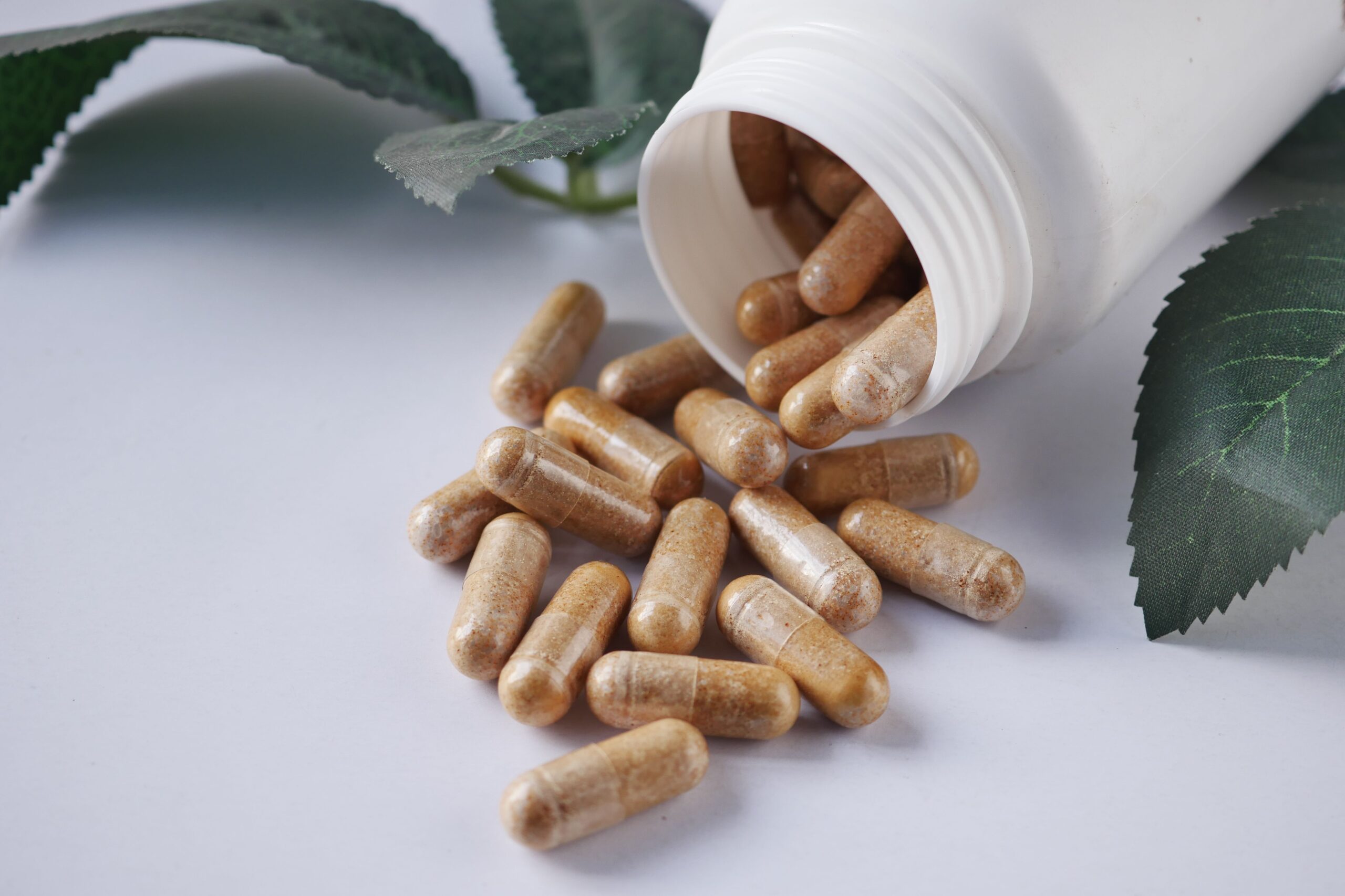 Herbal supplement capsules with botanical plant ingredients